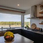 Kitchen corner window allows for a beautiful view of the surrounding landscape.