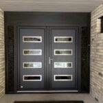 Two doors are better than one. Love this unique looking modern entrance door.