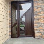 Premium quality entrance door in Royal Dark Oak with asymmetric lines and panel and partial see through glass. c