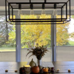 Thanksgiving themed dining-room table with Access tilt and turn windows in the background