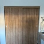 Bypass Door in Classic Oak with with a grip handle.