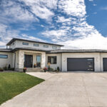 Contemporary custom prairie home featuring large European-style energy-efficient windows, clerestory windows, and a bright open-concept interior by ACCESS Window and Door Design Centre.